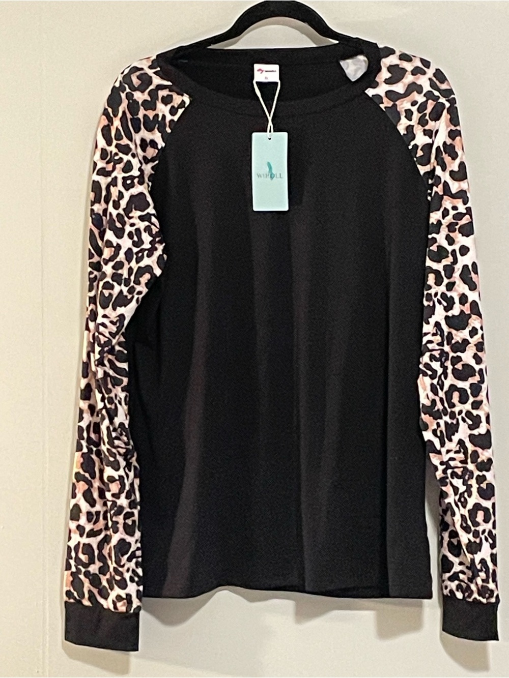 Wild Doll Black Long-Sleeve Tee with Leopard Print Sleeves. Item #11621